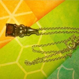 16" NRT silver chain with a brown/reddish stone